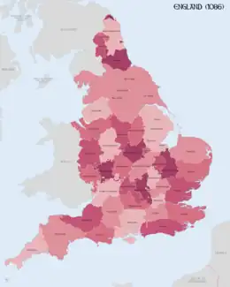 Map, colored in various shades of pink and purple, displaying the divisions of England at the time of the Domesday Survey.