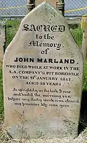 Grave Stone of John Marland, who died whilst working in the Borehole. This grave stone is located behind the Christchurch Cathedral, Newcastle, New South Wales