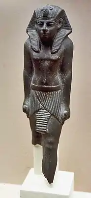 Image 17Statuette of Merankhre Mentuhotep, a minor pharaoh of the Sixteenth Dynasty, reigning over the Theban region c. 1585 BC. (from History of ancient Egypt)