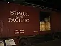 An 1879 boxcar shows how railroads transported wheat to the mills, and flour to market