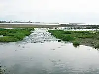 The outflow of the Montfode Burn onto Ardrossan North Bay. Boundary between the estates of Montfode and Eglinton.