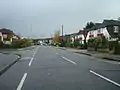 The 1930s suburban street known as Motspur Park and site of the original Mospur Farm. The houses on this side of the railway were built by Wates builders.