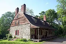 Photo of stone and wood house