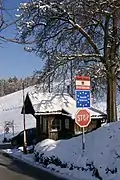 Looking into Austria from Liechtenstein, with a joint border station. Since Liechtenstein joined the Schengen Area in 2011, this border station is for customs formalities only.