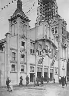 Pavilion #1 (Ichigō-kan) of Osaka Luna Park, also known as Shinsekai Luna Park, between 1912 and 1920. The original Tsutenaku Tower can be seen in the background. The park closed in 1923; the tower was dismantled 20 years afterward.