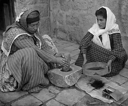 Image 22Palestinian women grinding coffee, 1905 (from History of coffee)