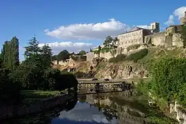 The west side of the Partenay citadel from the Saint-Paul Bridge over the River Thouet