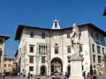 Palazzo dell'Orologio with the statue of Cosimo I