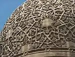 Closeup of the dome's stone-carved relief patterns