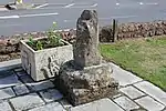 Wayside cross at junction of High Street and Bank Street