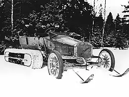 "Russo-Balt "C24-30" from the garage of Tsar Nicholas II with Kégresse track design of Adolphe Kégresse.  Adolphe Kégresse possibly seated on the right of the photograph