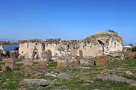 St. Gevorg Church of Geghhovit (1873) and surrounding medieval cemetery.