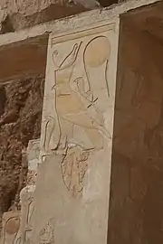 Two images of Wadjet appear on this carved wall in the mortuary temple of Hatshepsut at Luxor.