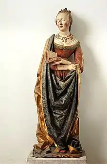 Saint Barbara, a sculpture statuette in limewood, c.1490