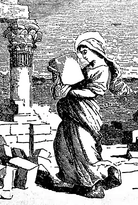 St. Eupraxia carrying heavy rocks as a penitential labor.