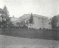 A white Neoclassical school building