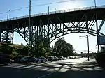 A steel bridge over a roadway