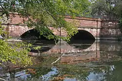 aqueduct over creek and lock house