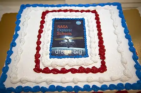 An International Space Station-themed NASA slab cake for students at Kennedy Space Center, featuring edible ink printing