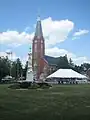 St. John the Baptist church with monument of Johann Wilhelm Horstmann