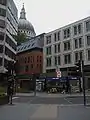 Western entrance with St Paul's Cathedral in the background (2003)