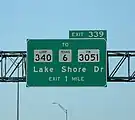 Guide sign: destination sign along Interstate 35 showing typical signage for a Farm to Market Road (right), along with signage for a State Highway Loop (left) and a State Highway (center) for comparison