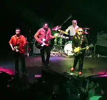 The Minus 5 performing in 2006. From left to right: John Ramberg, Peter Buck, Bill Rieflin and Scott McCaughey.