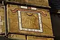 The sundial on the belltower of Saint-Sauveur church