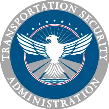 The insignia of the parent agency, the TSA