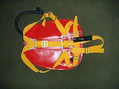 Lightweight travel diving harness with wing buoyancy compensator and minimal backplate suitable for single back mount cylinder or side mount cylinders - front view.