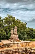 Two pillars standing alone near the temple.