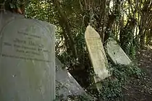 Tottering Victorian headstonesin Woolaton, in Nottingham, England