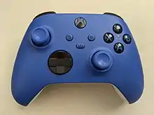 Front view of the Xbox Series X and Series S wireless controller, showing the additional share button and revised cosmetics.