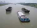 Self-propelled barges on the Grand Canal of China near Yangzhou, Jiangsu, China