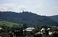 View of the castle hill and Zborov Castle from the village (August 2011)